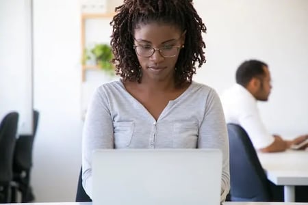 person using a computer to learn what github is used for